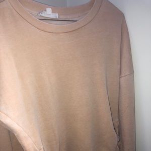 sweater with ties on the bottom